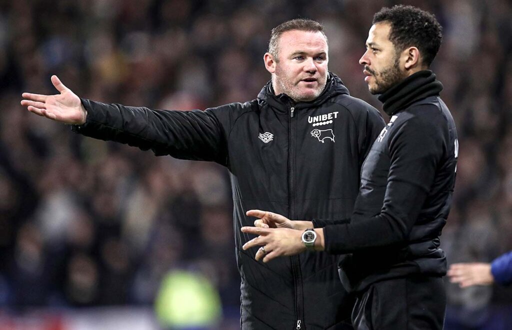 Wayne Rooney y Liam Rosenior